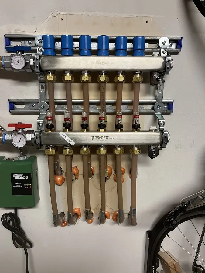 Plumber performing Water Heater Repair at a residential property in Destrehan